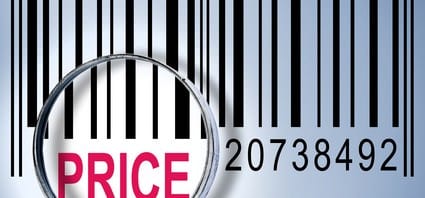 Price under magnifyng glass on barcode